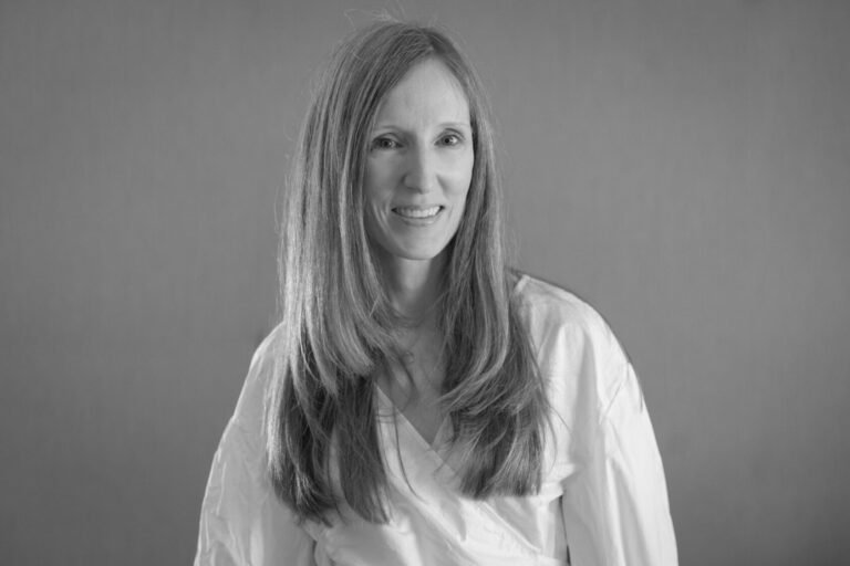 Melanie at CraigScottCapital: Who Is She and What We Know